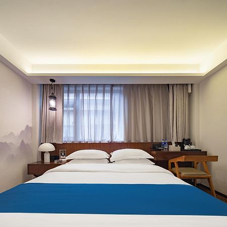 張家界武陵源北岸輕奢客棧 森林公園店 Hotel Zhangjiajie Exterior photo