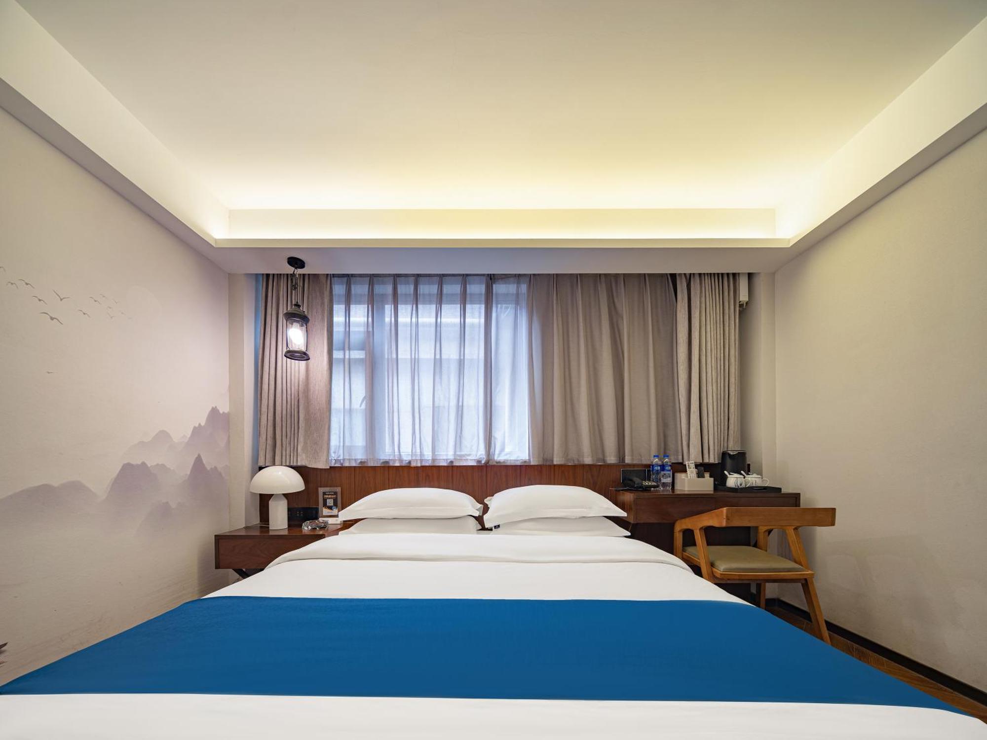 張家界武陵源北岸輕奢客棧 森林公園店 Hotel Zhangjiajie Exterior photo