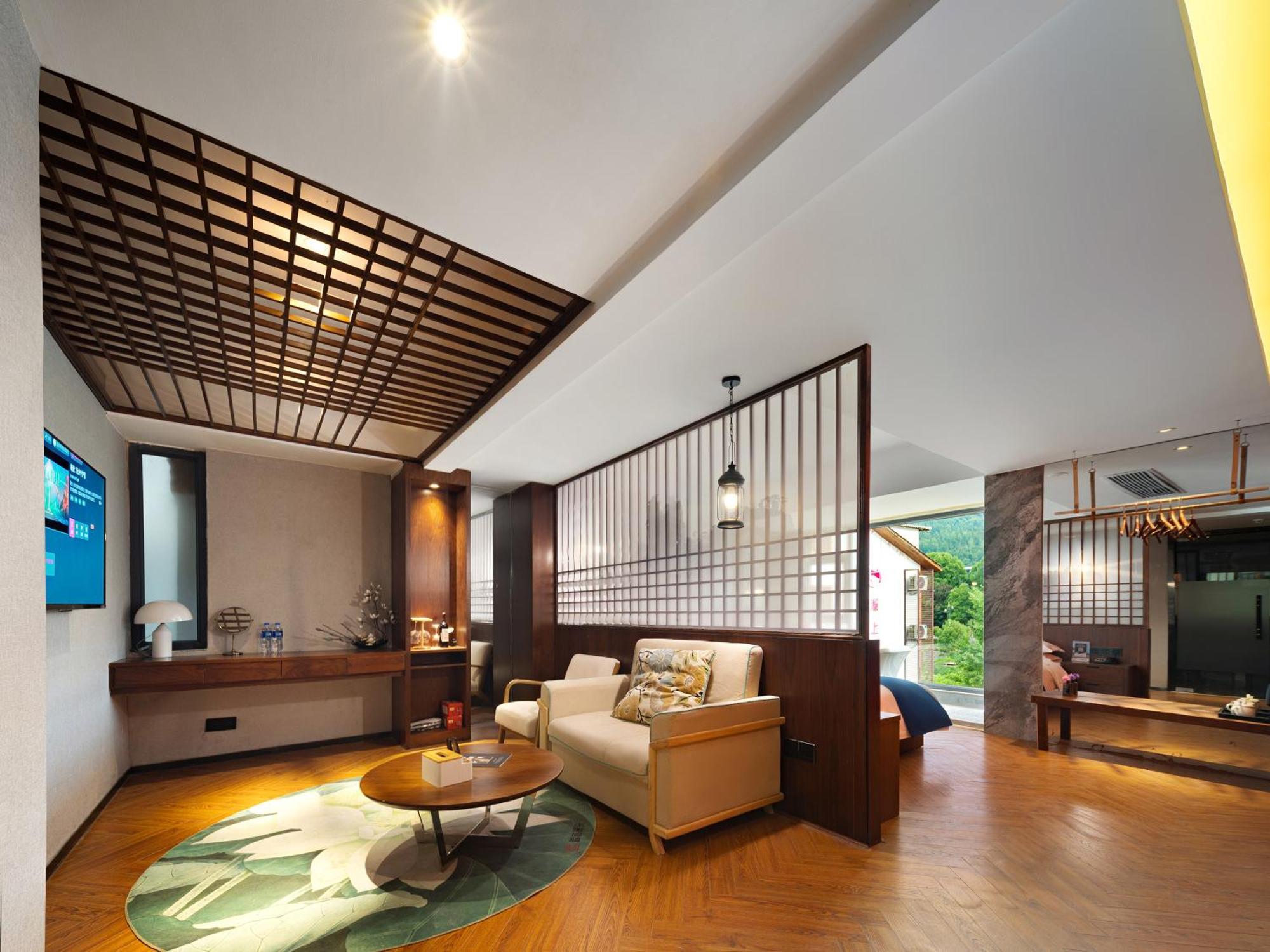 張家界武陵源北岸輕奢客棧 森林公園店 Hotel Zhangjiajie Exterior photo