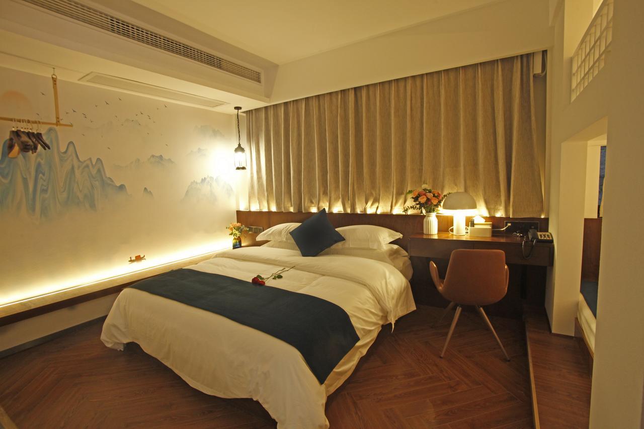 張家界武陵源北岸輕奢客棧 森林公園店 Hotel Zhangjiajie Exterior photo