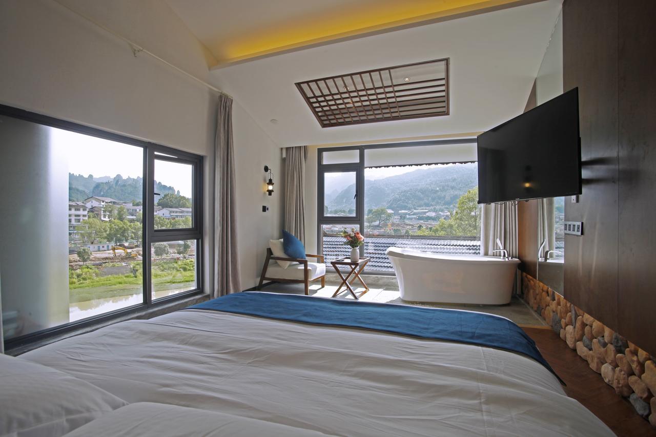 張家界武陵源北岸輕奢客棧 森林公園店 Hotel Zhangjiajie Exterior photo